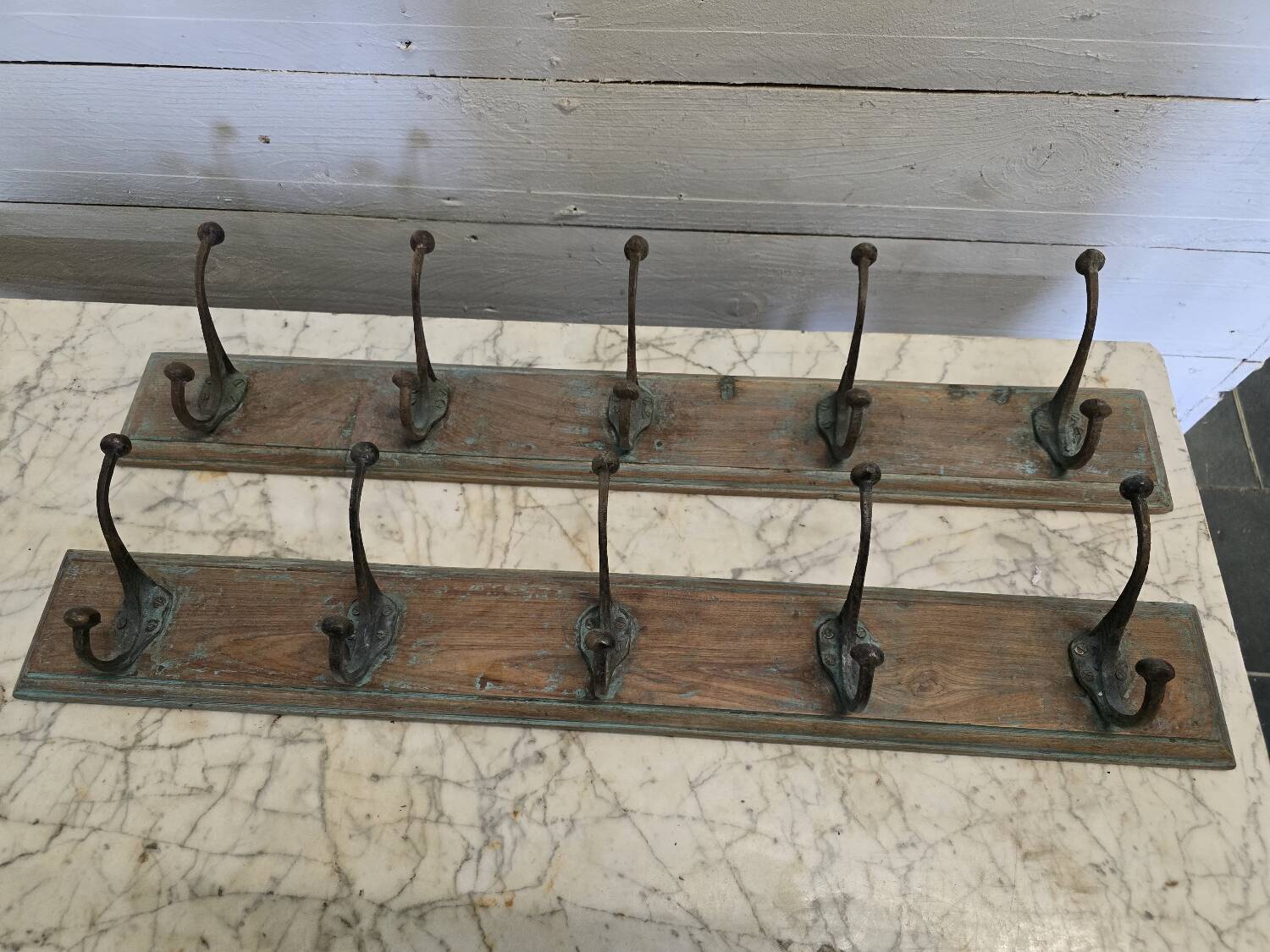 Wooden school coat rack and cast iron coat hooks