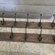 Wooden school coat rack and cast iron coat hooks