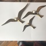 Trio of brass birds