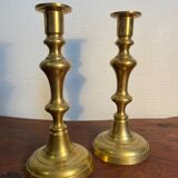 Pair of duo of ringed brass candlesticks