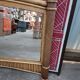 Miroir mural vintage en bambou et cannage, glace biseautée