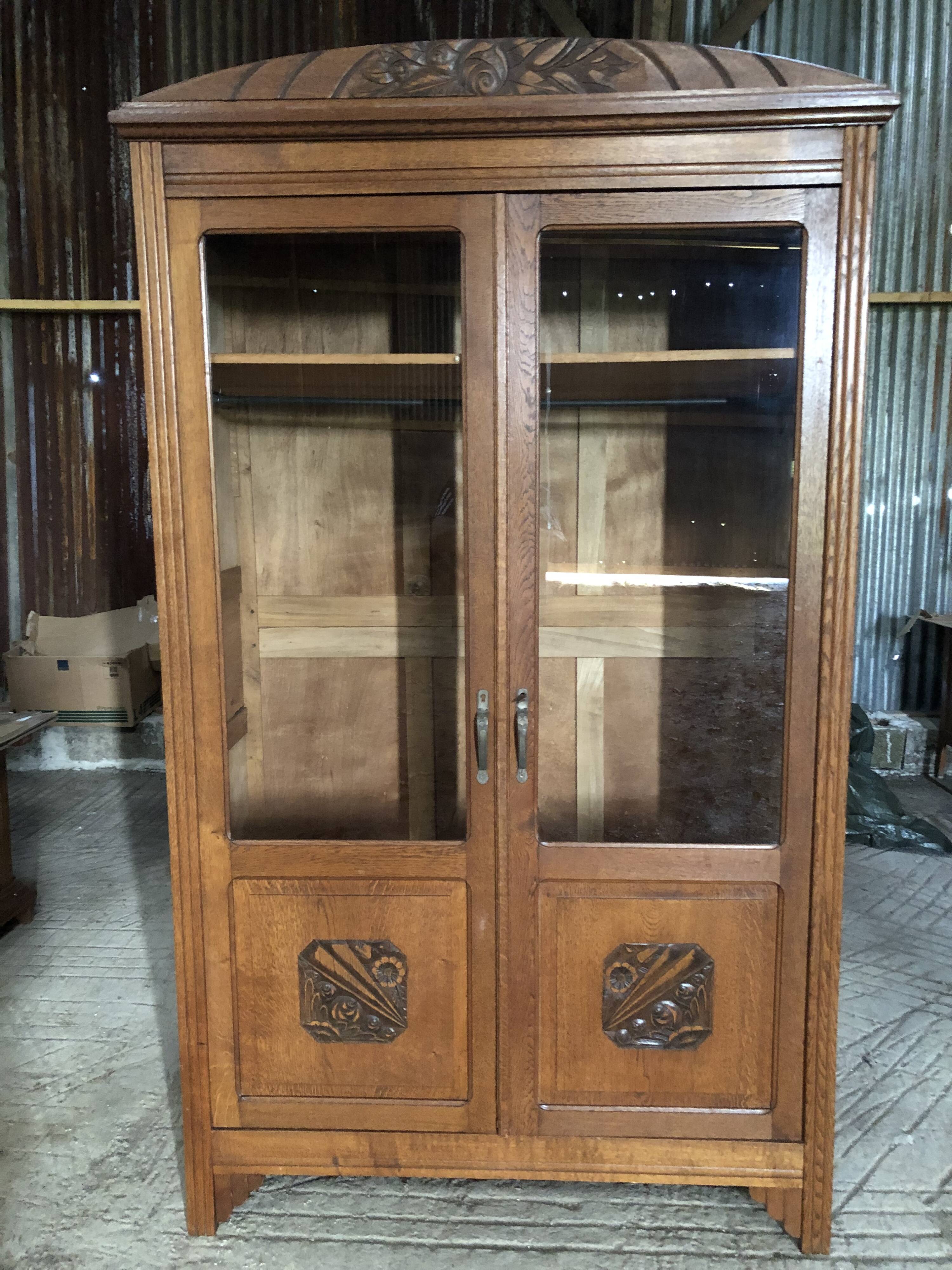 Vintage rococo oak bookcase with 2 glass doors.