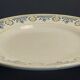 Pair of Saint Amand 20th century earthenware dinner plates