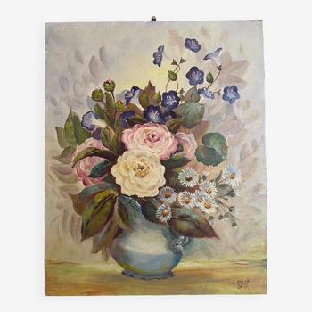 Oil painting bouquet of flowers in a vase.