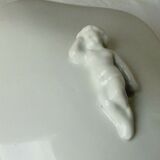 Candy in white porcelain decor cherubin putto