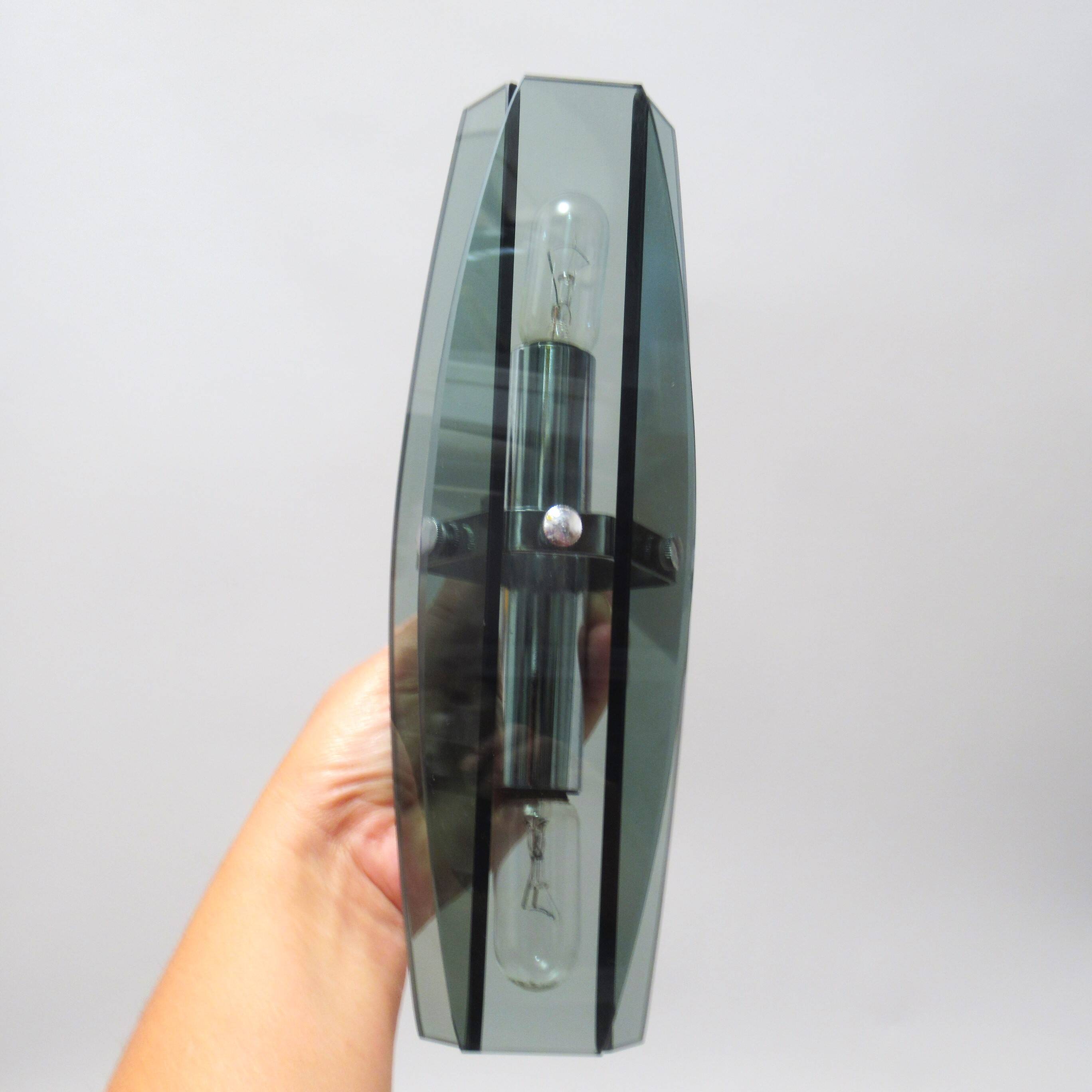 Pair of Veca smoked glass and chrome wall lights from the 70s