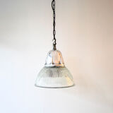 Suspension in ridged glass and support in polished cast aluminum