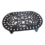 Dessous de plat en fonte