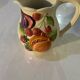 Vintage earthenware carafe