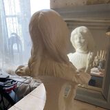 Bust of a young girl with long braids, Art Nouveau style