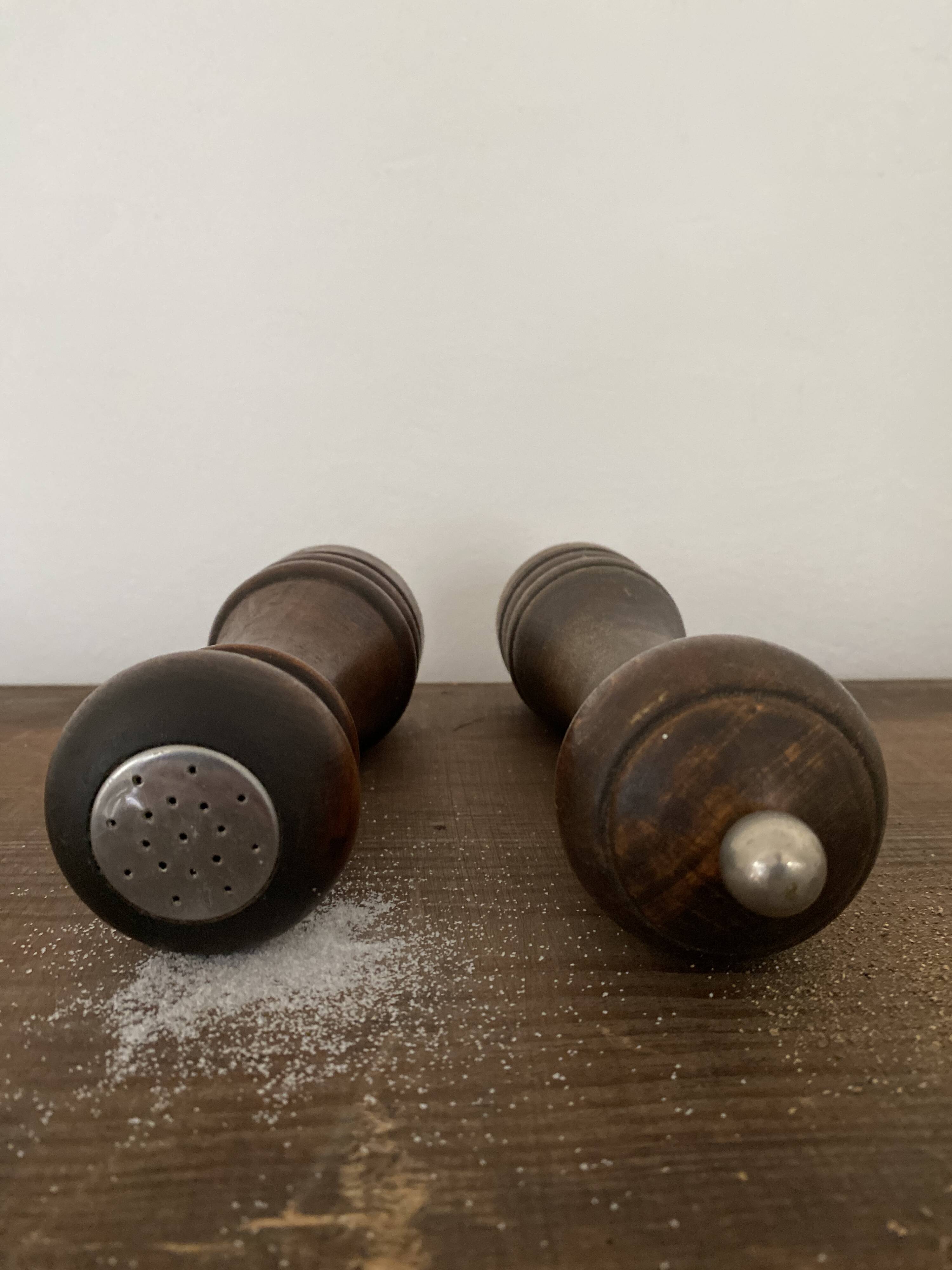Vintage turned wooden pepper and salt mill