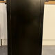 Asian-inspired black lacquered wooden wardrobe