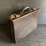 Small black grained leather travel suitcase from the 1920s