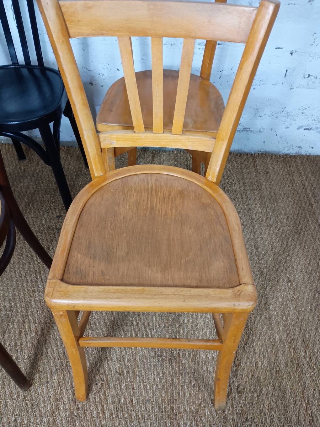 Set of 8 mismatched vintage Baumann Lebrun bistro chairs.