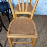 Set of 8 mismatched vintage Baumann Lebrun bistro chairs.
