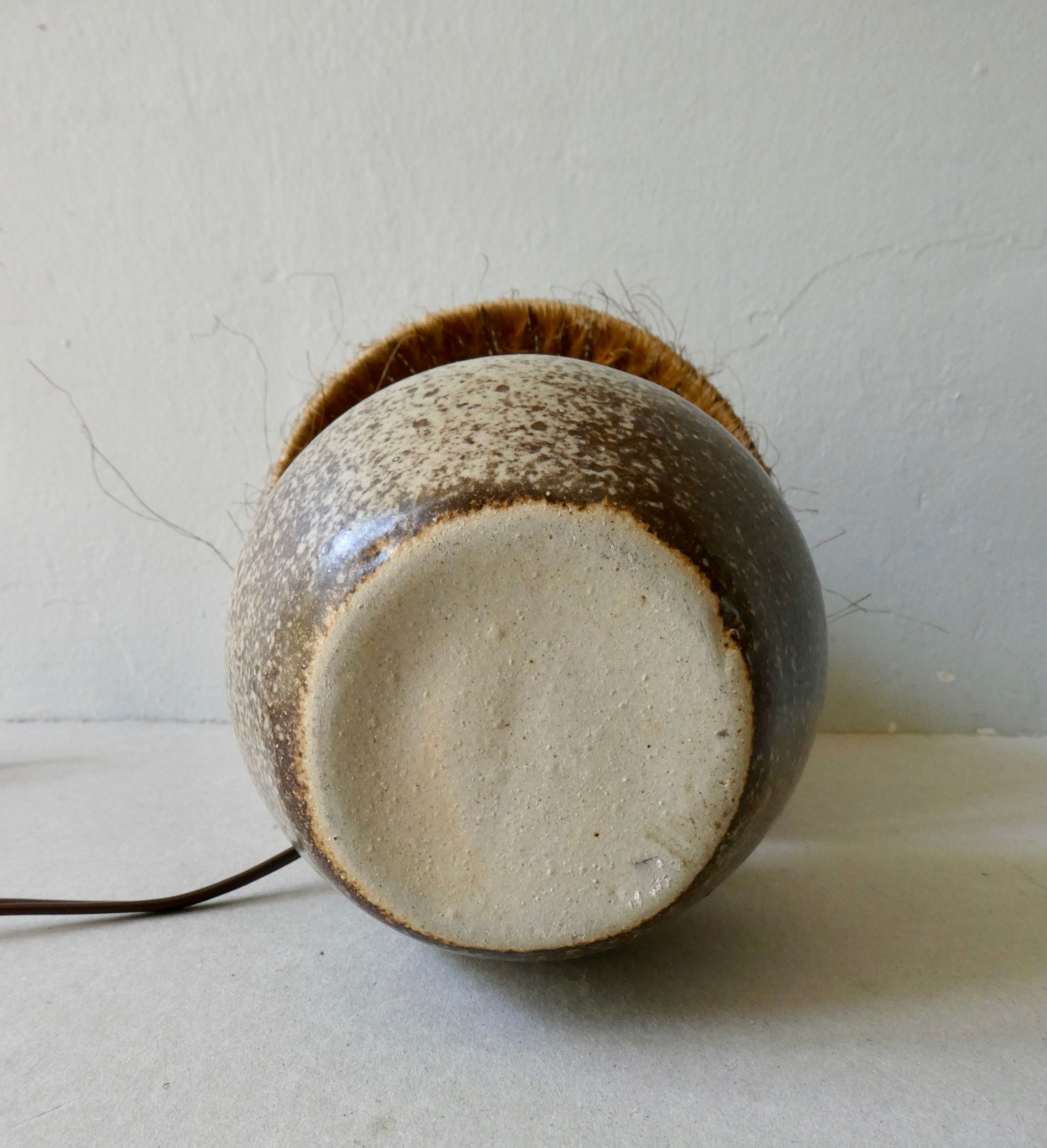 Sandstone lamp with natural fiber lampshade