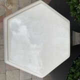 Column wears vintage plant