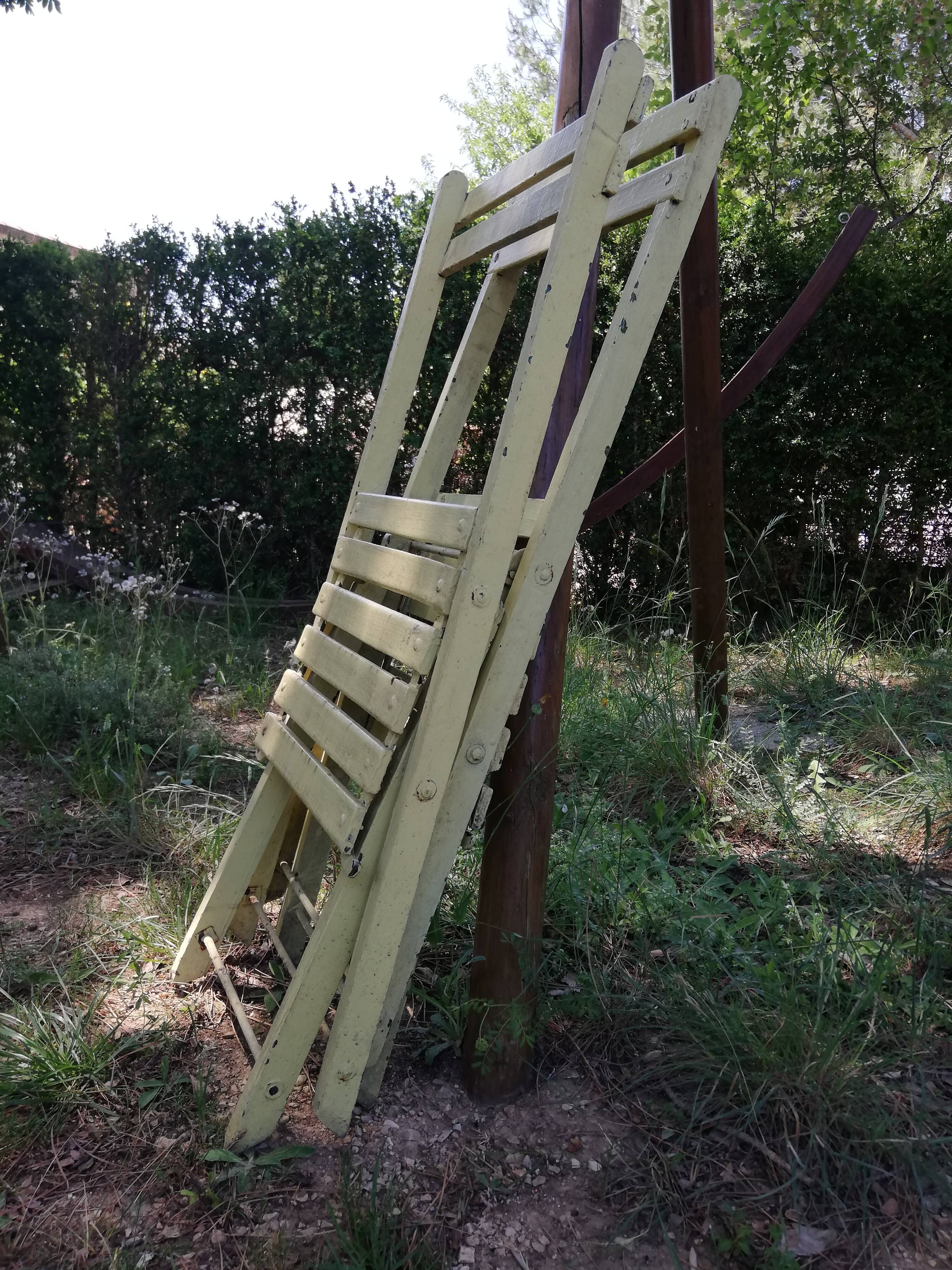 Two folding garden chairs