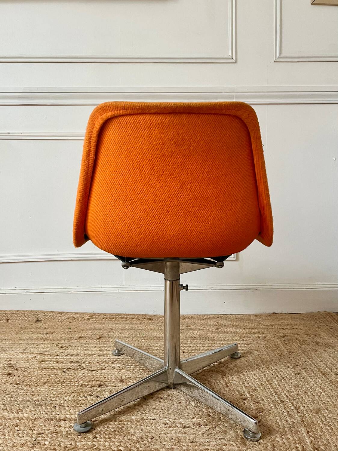 Chrome metal chair with orange fabric from the 70s.