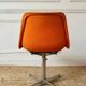 Chrome metal chair with orange fabric from the 70s.