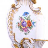 A pair of porcelain wall lamps from Capodimonte, Italy.