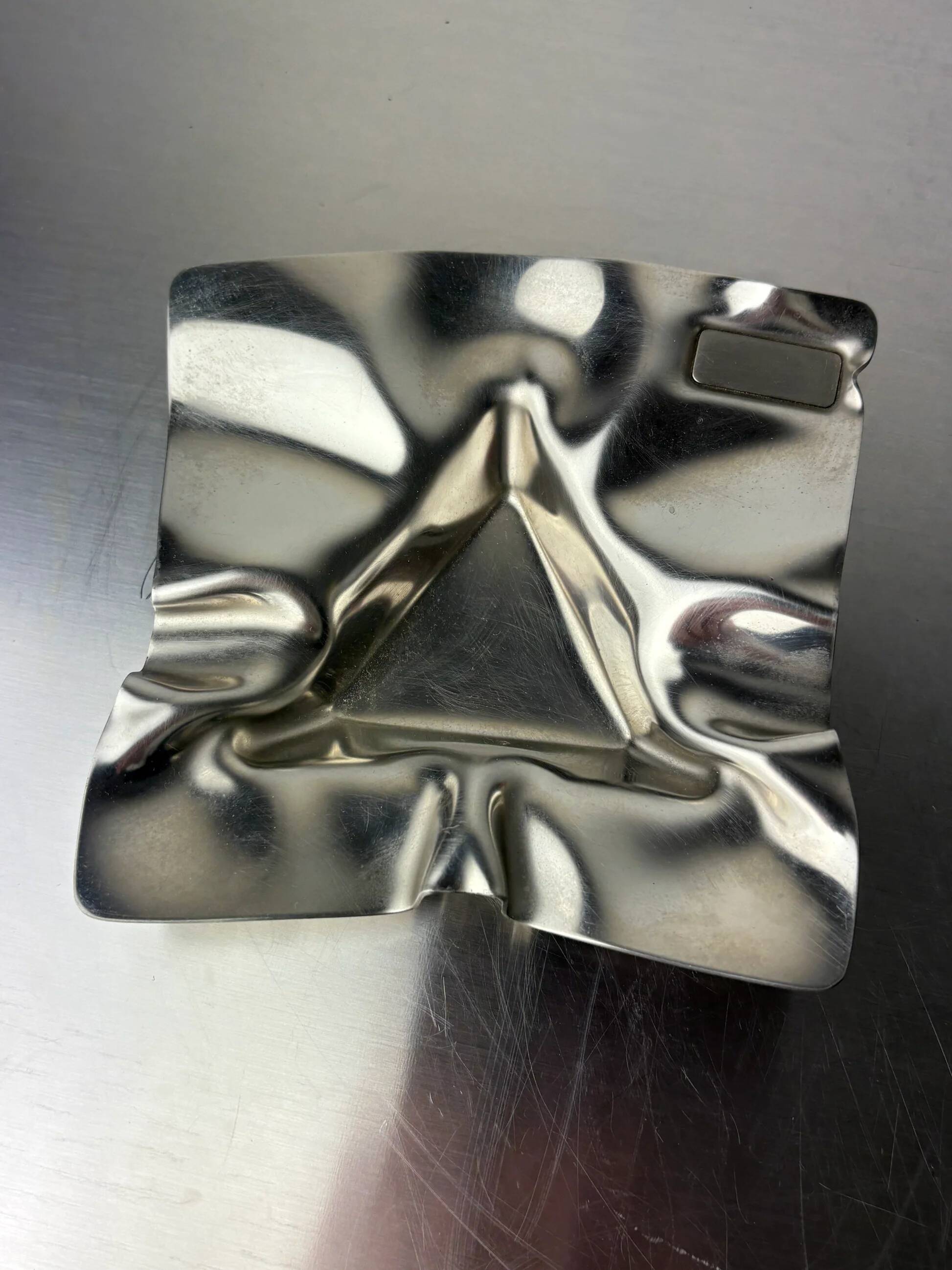 Biomorphic ashtray, stainless steel, Spain, 1970s