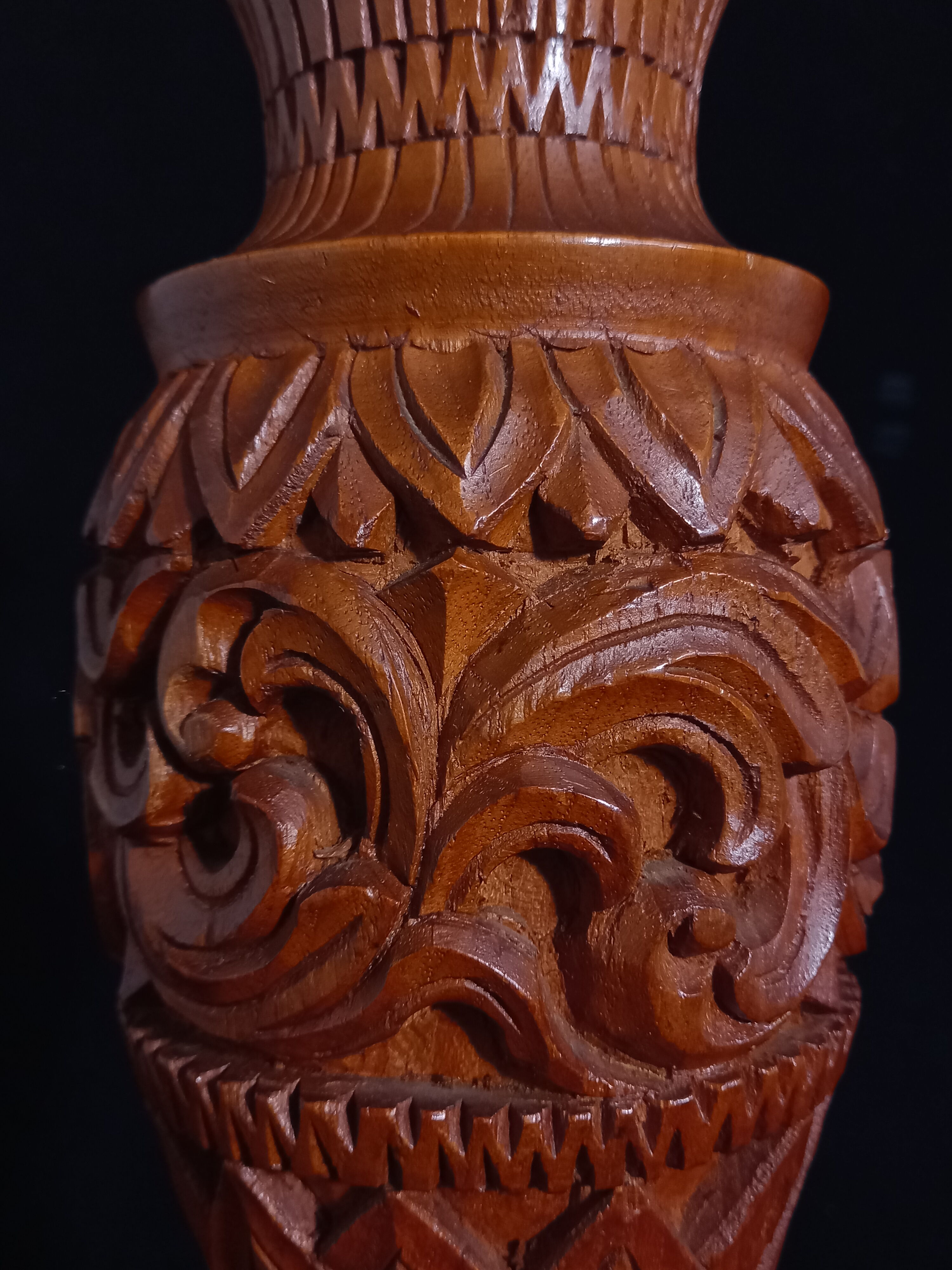 Exotic vase in carved wood
