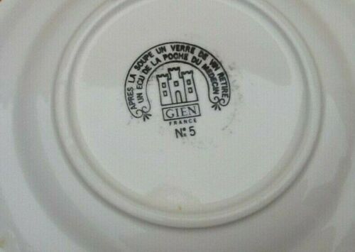 Plate " rebus " Faience of Gien After the soup a glass of wine removes a shield from the...