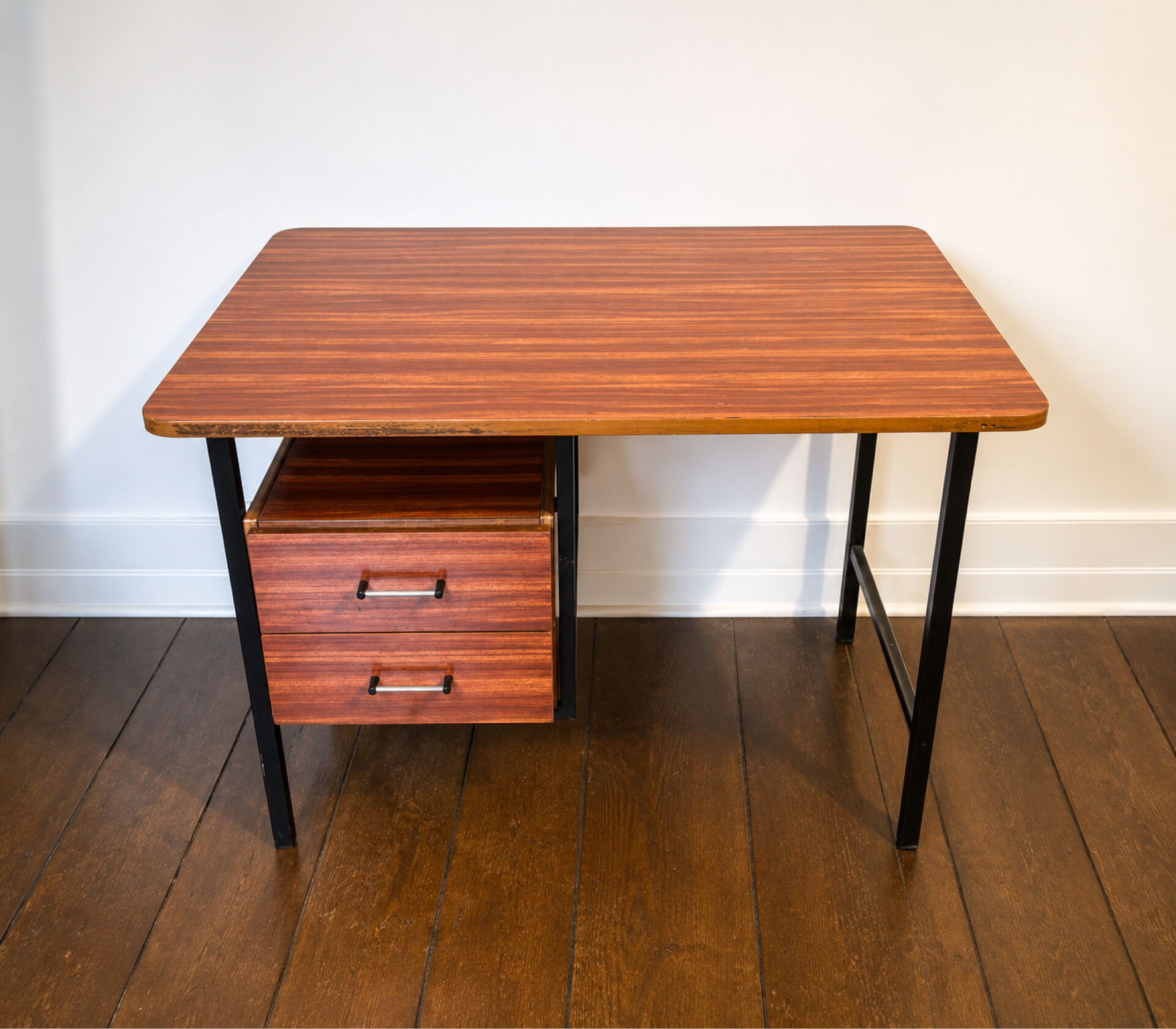 Modernist desk from the 50s-60s in wood and metal, reversible drawer unit.
