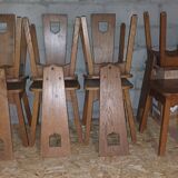 8 brutalist solid oak chairs