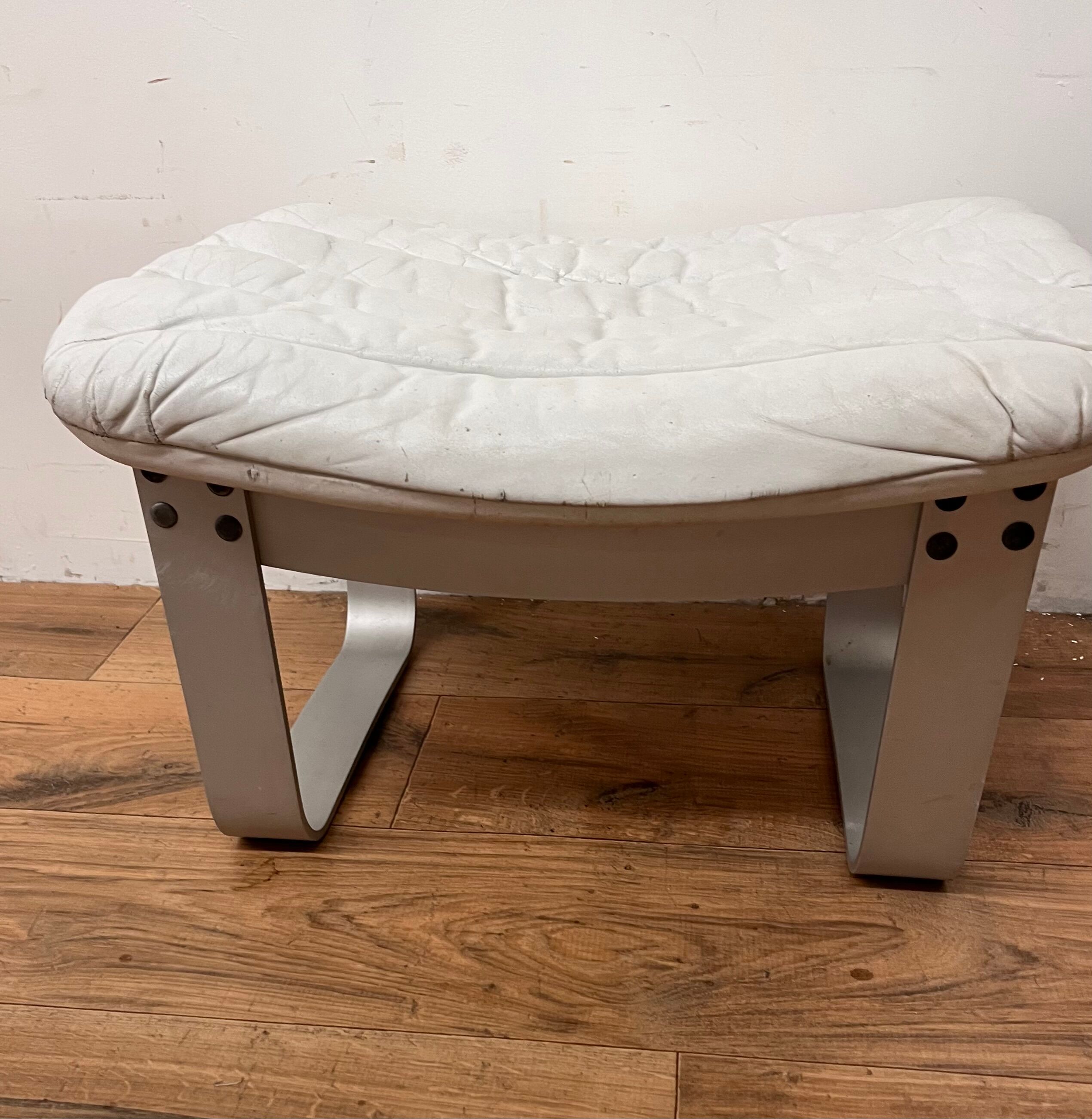 Pulkka armchair by Ilmaria Lappalainen and its ottoman