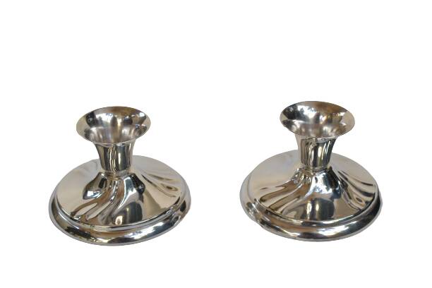 Pair of silver metal candlesticks