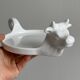 White porcelain cheese dish with handle and cow's head