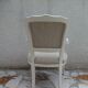 Louis XV style armchair in patinated beige, upholstered in beige fabric.