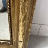 Louis Philippe mirror in wood and gilded stucco, 19th century
