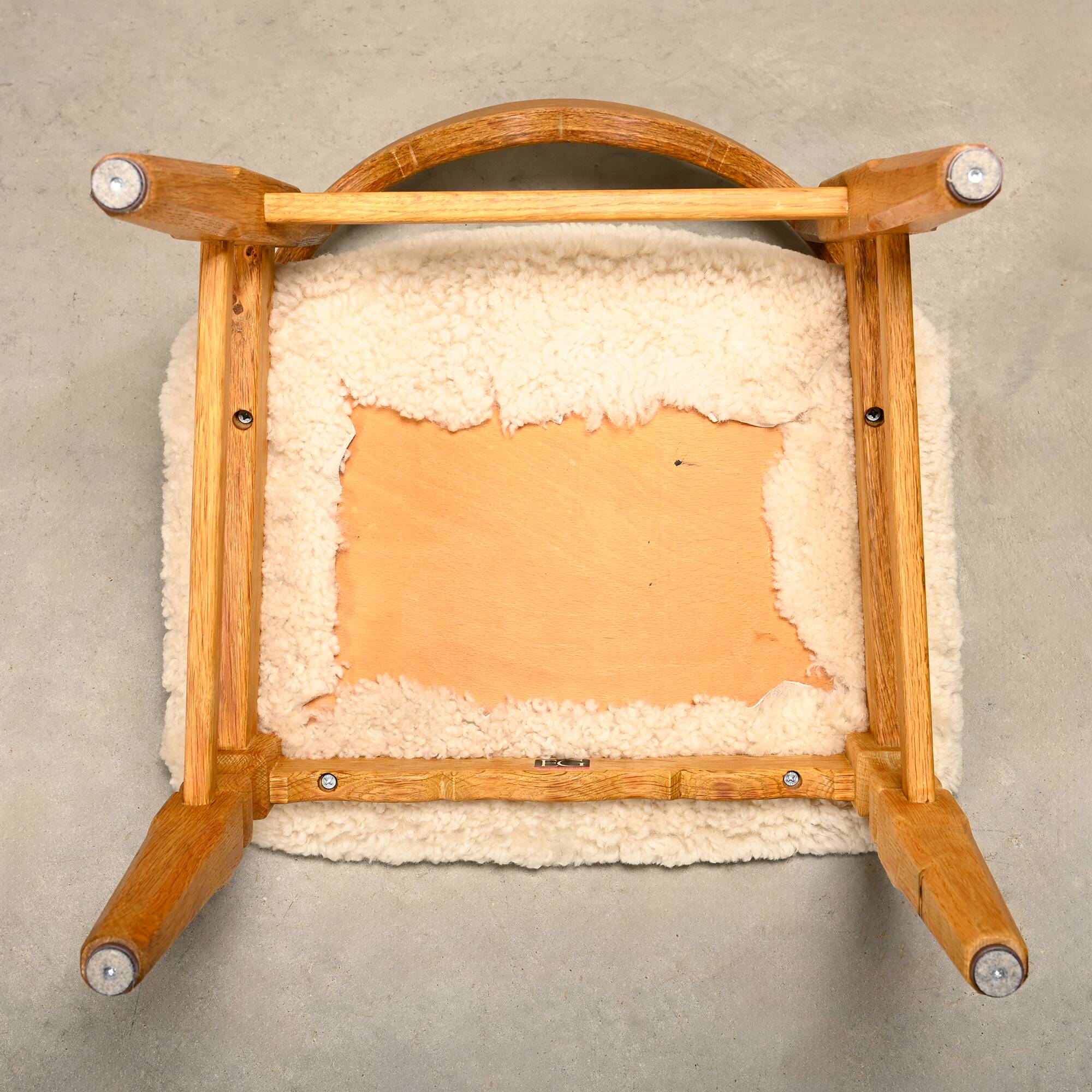 Henning Kjærnulf dining chairs set in Oak and Sheepskin, Denmark, 1960s