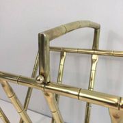 Brass faux-bamboo style magazine rack