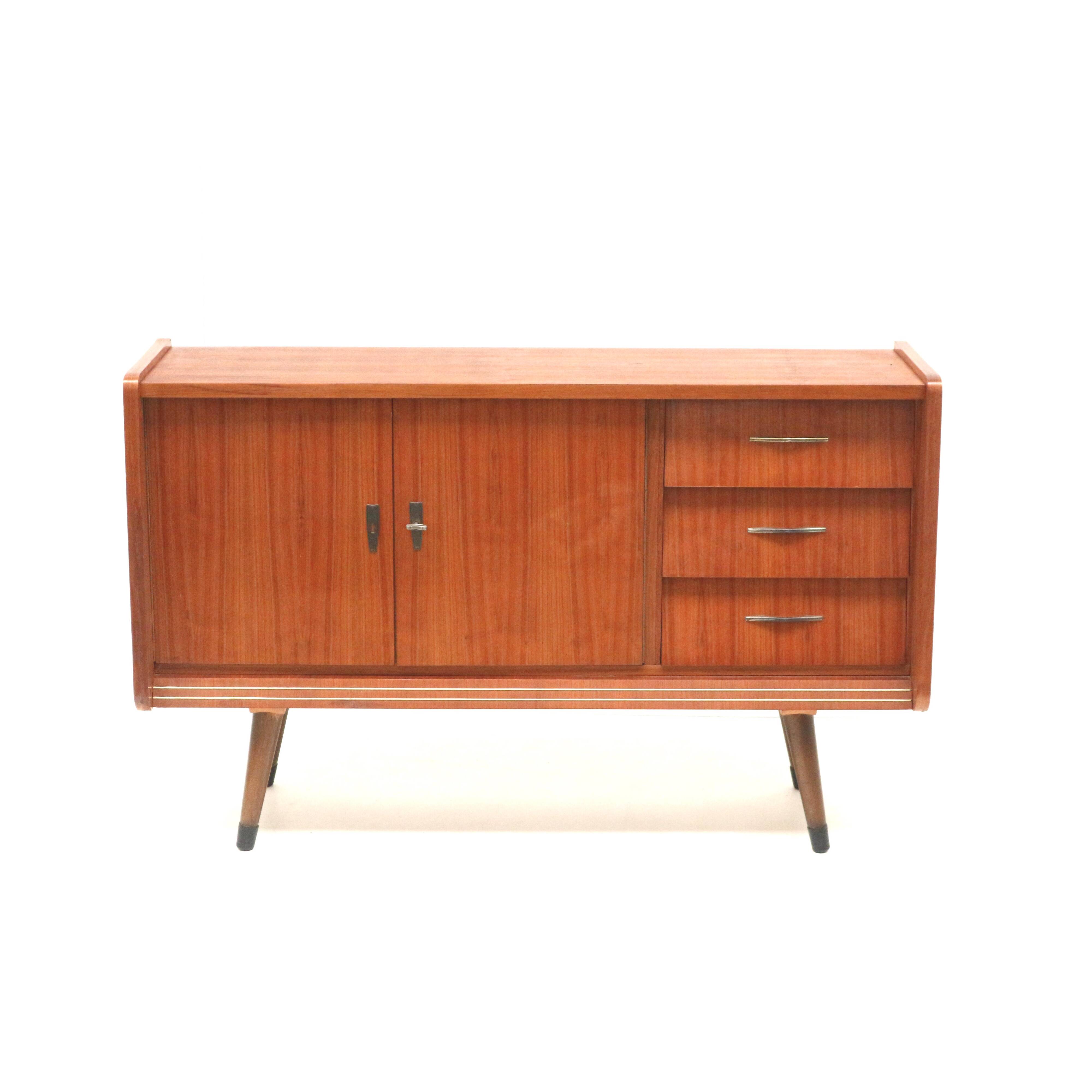 Vintage sideboard with drawers and doors made in the 50s