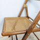 Chaise pliante à l'assise cannée