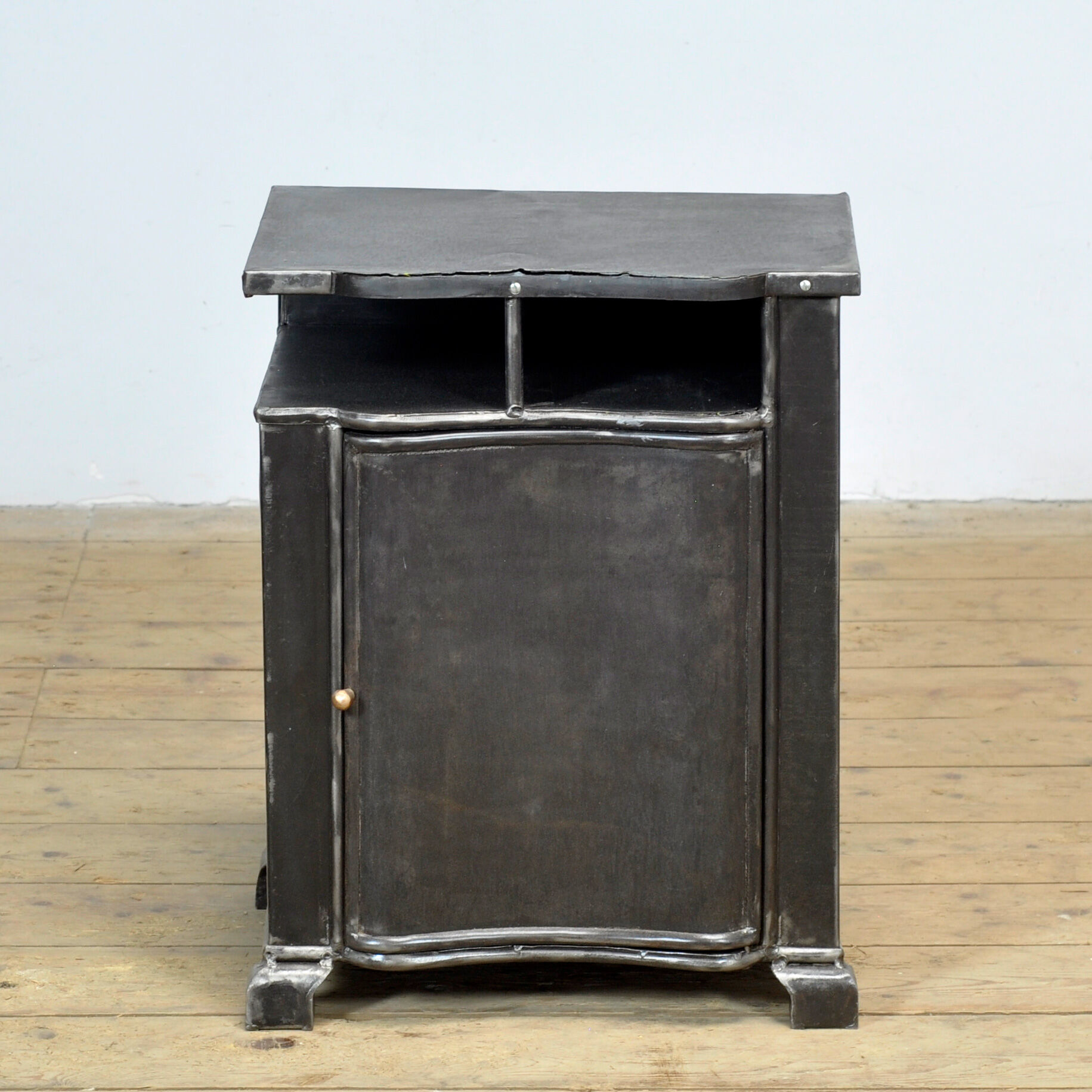 Iron bedside table, circa 1930