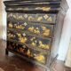 black English commode with gold decoration, Asian inspiration
