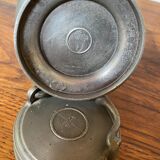 Tin pot with lid