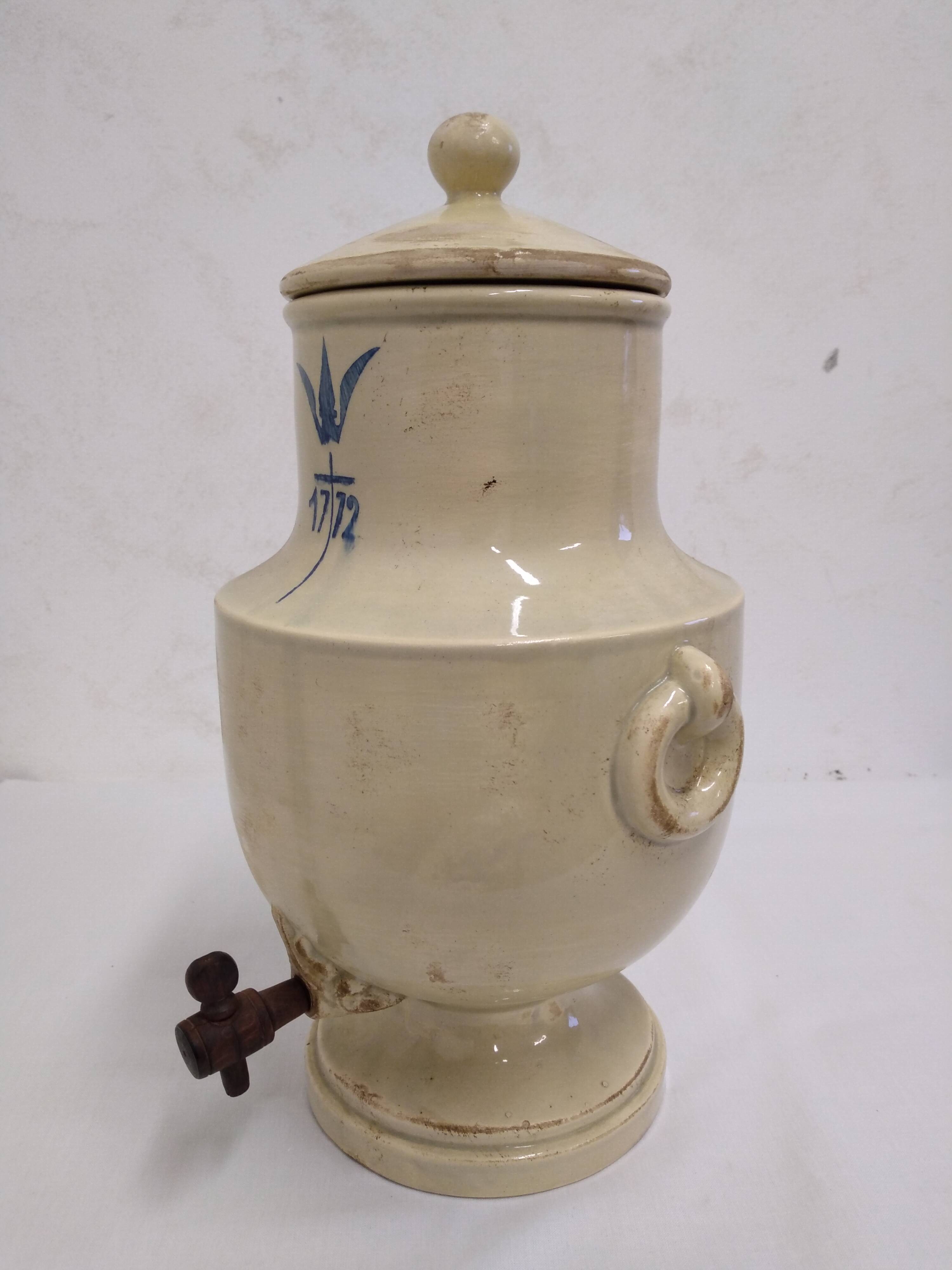 Old stoneware vinegar maker
