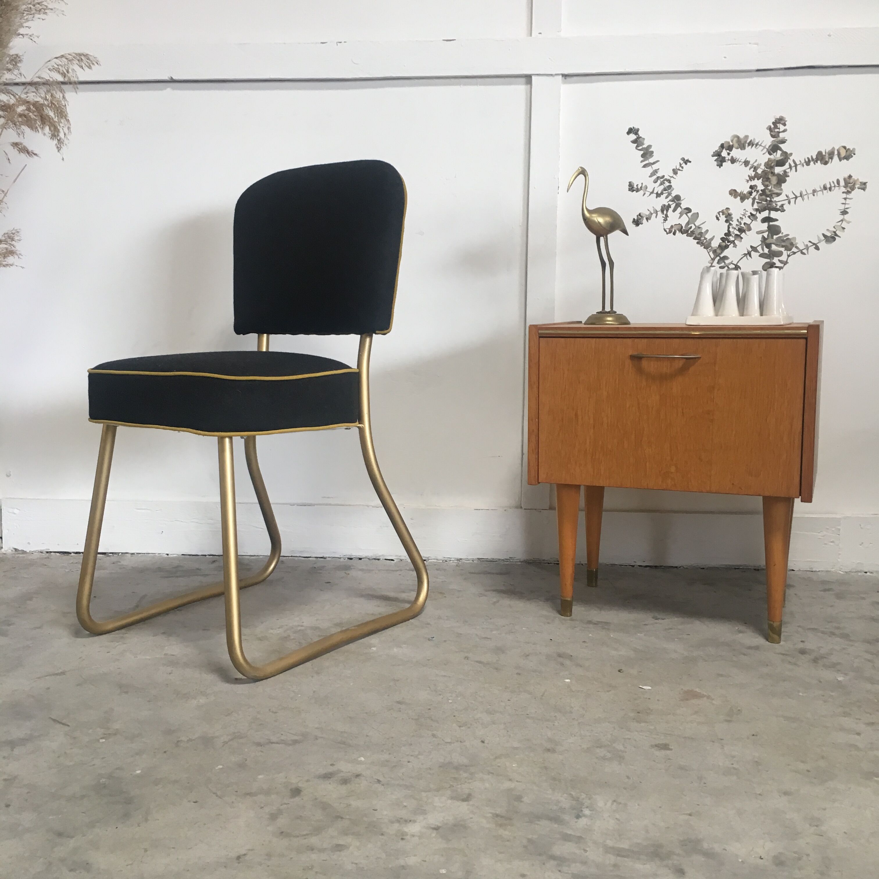 Golden black roneo chair restored to new