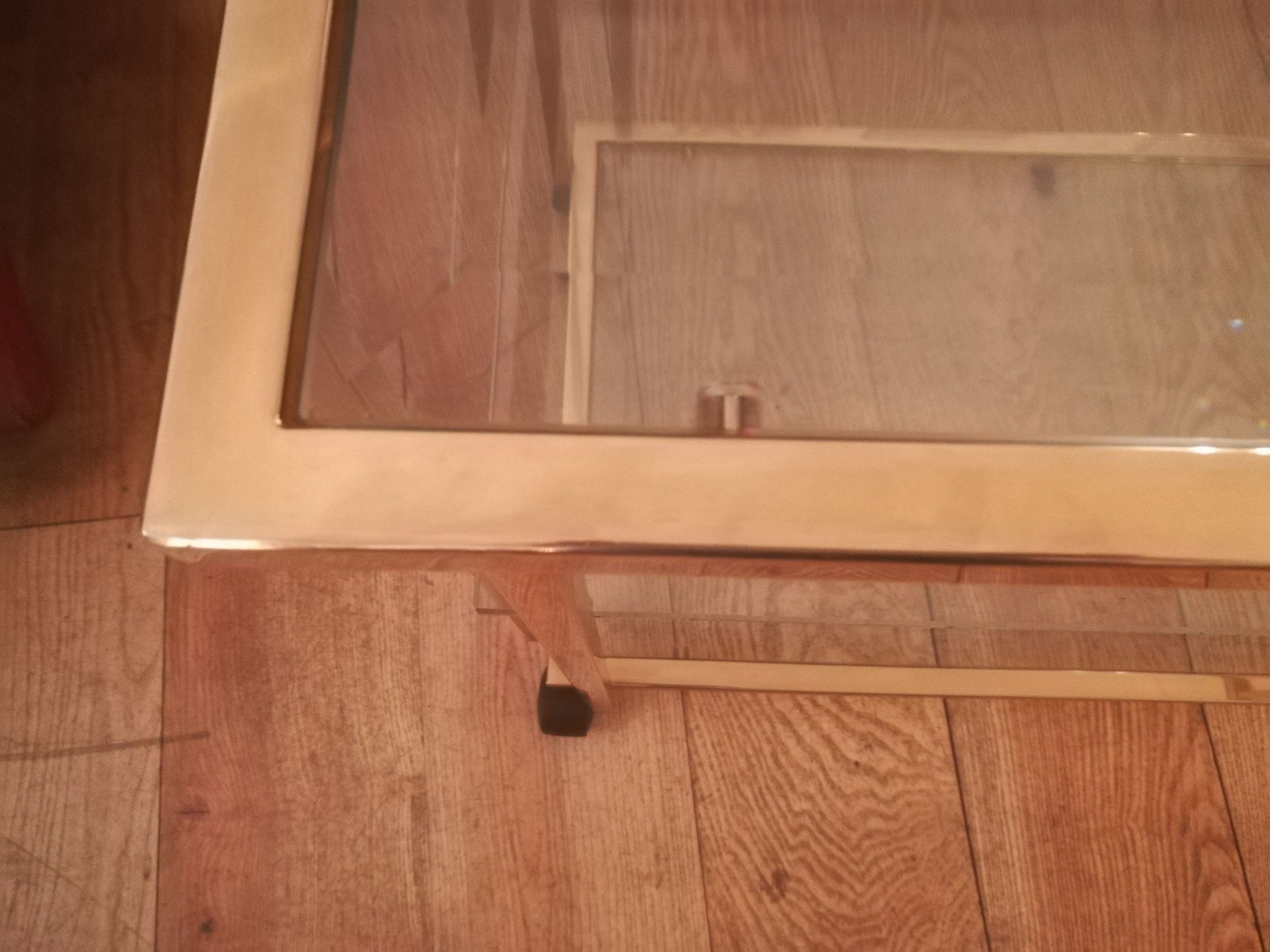 Desserte à roulettes en laiton doré et verre biseauté