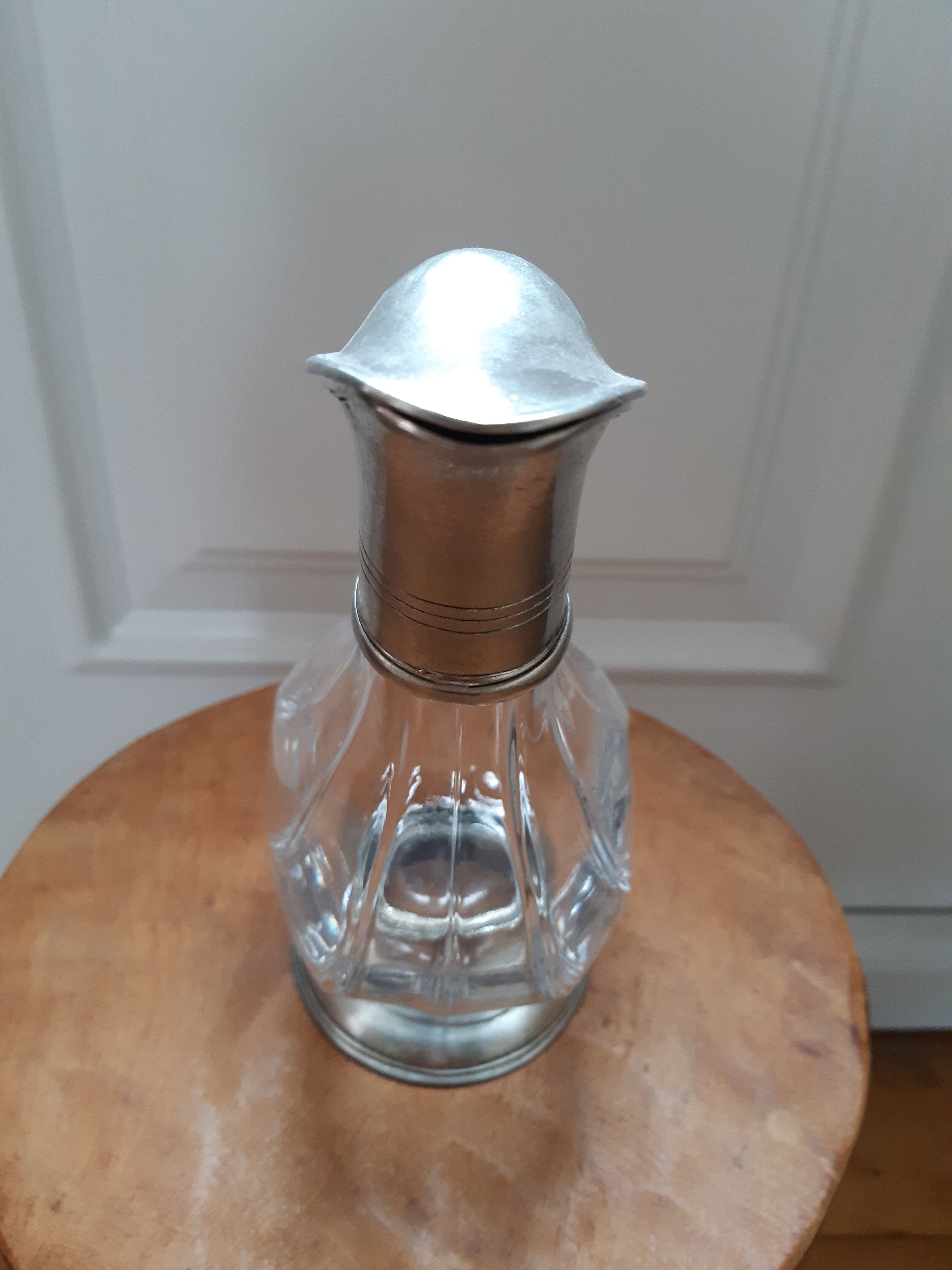 Old duck carafe in crystal and tin