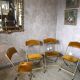 Quatre chaises pliantes velours et laiton