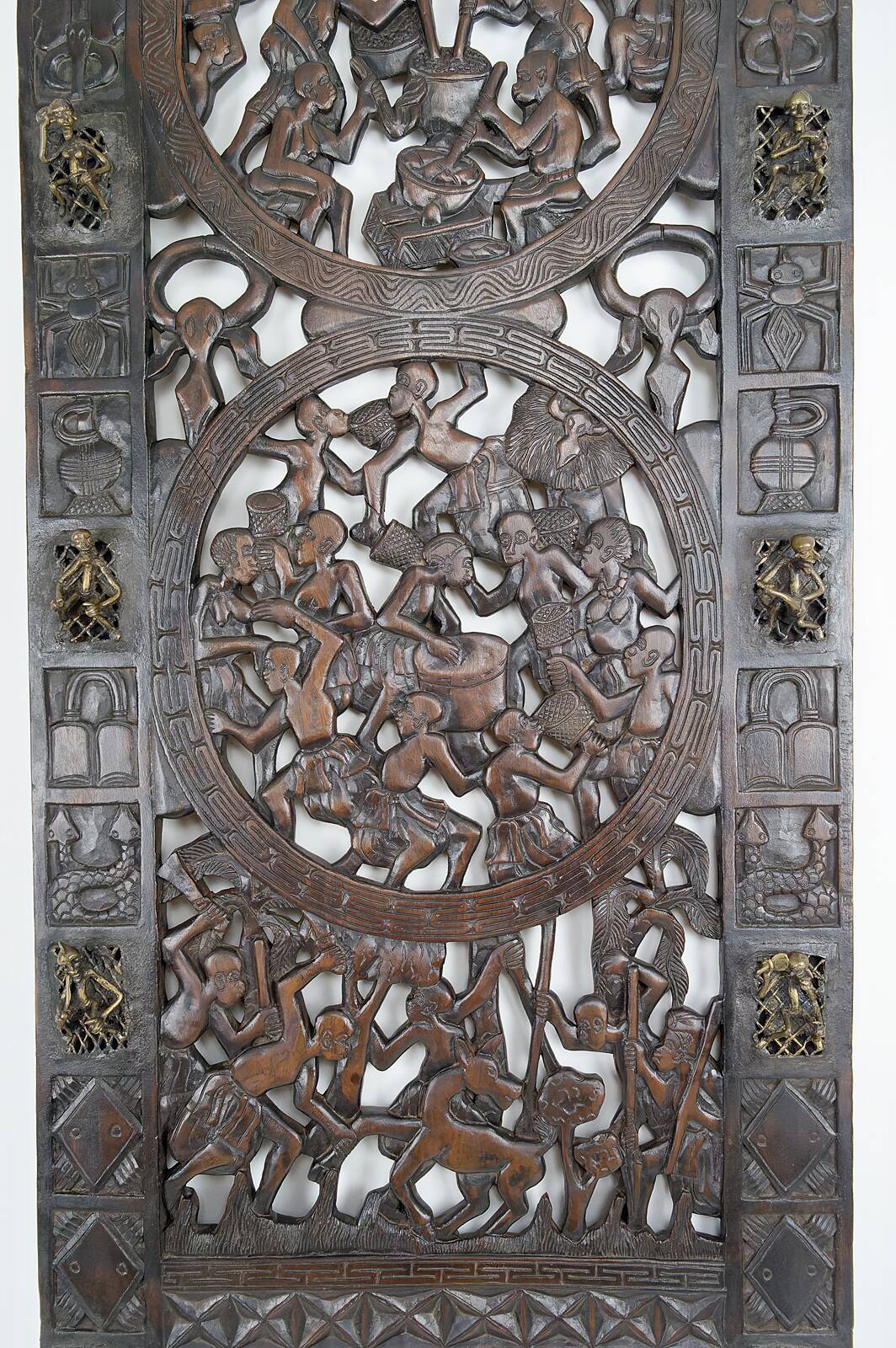 African door in carved wood and bronze of village chief Baboun, Cameroon, early 20th century