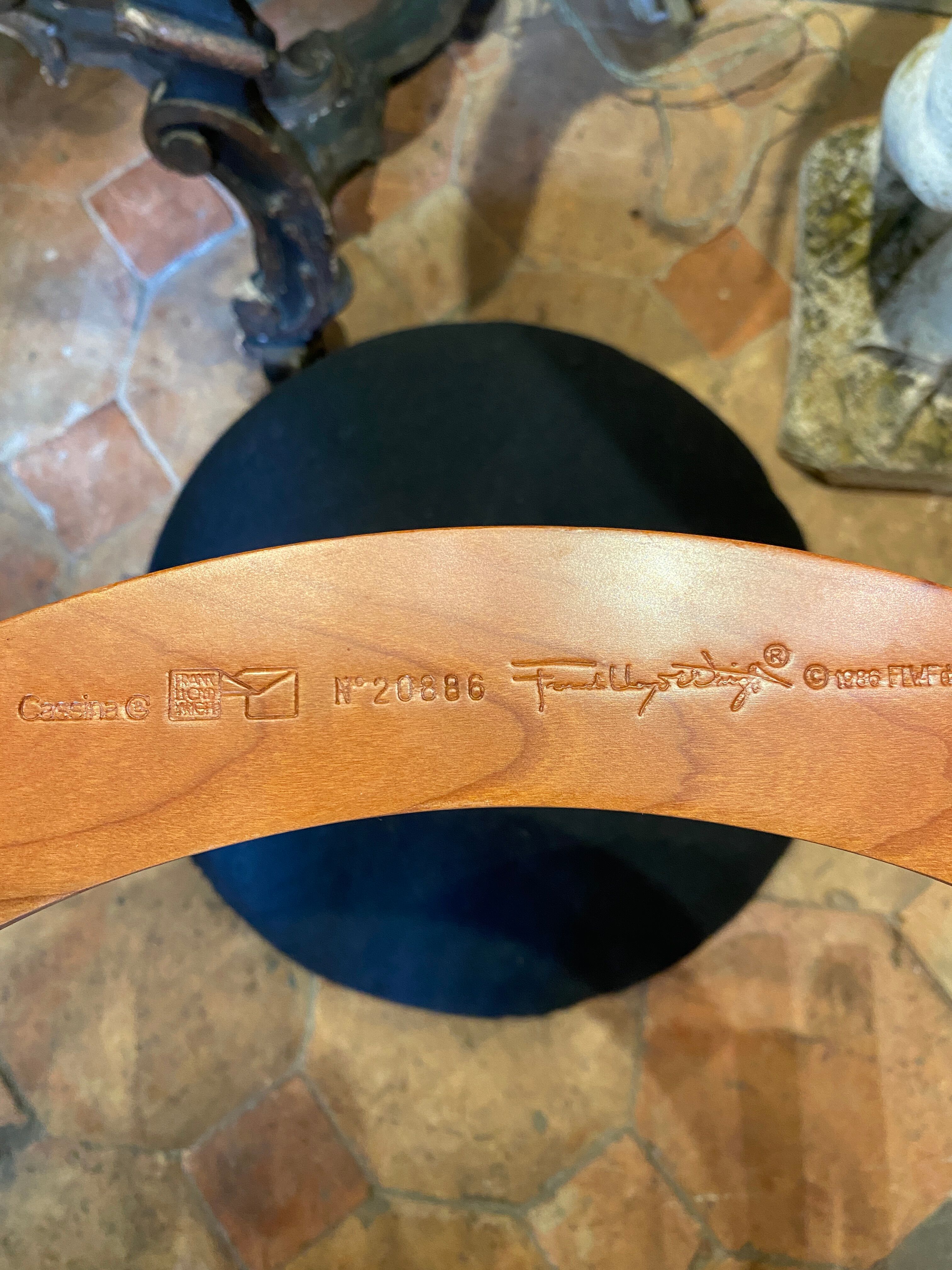 Pair of armchairs by Frank Lloyd Wright, Cassina edition