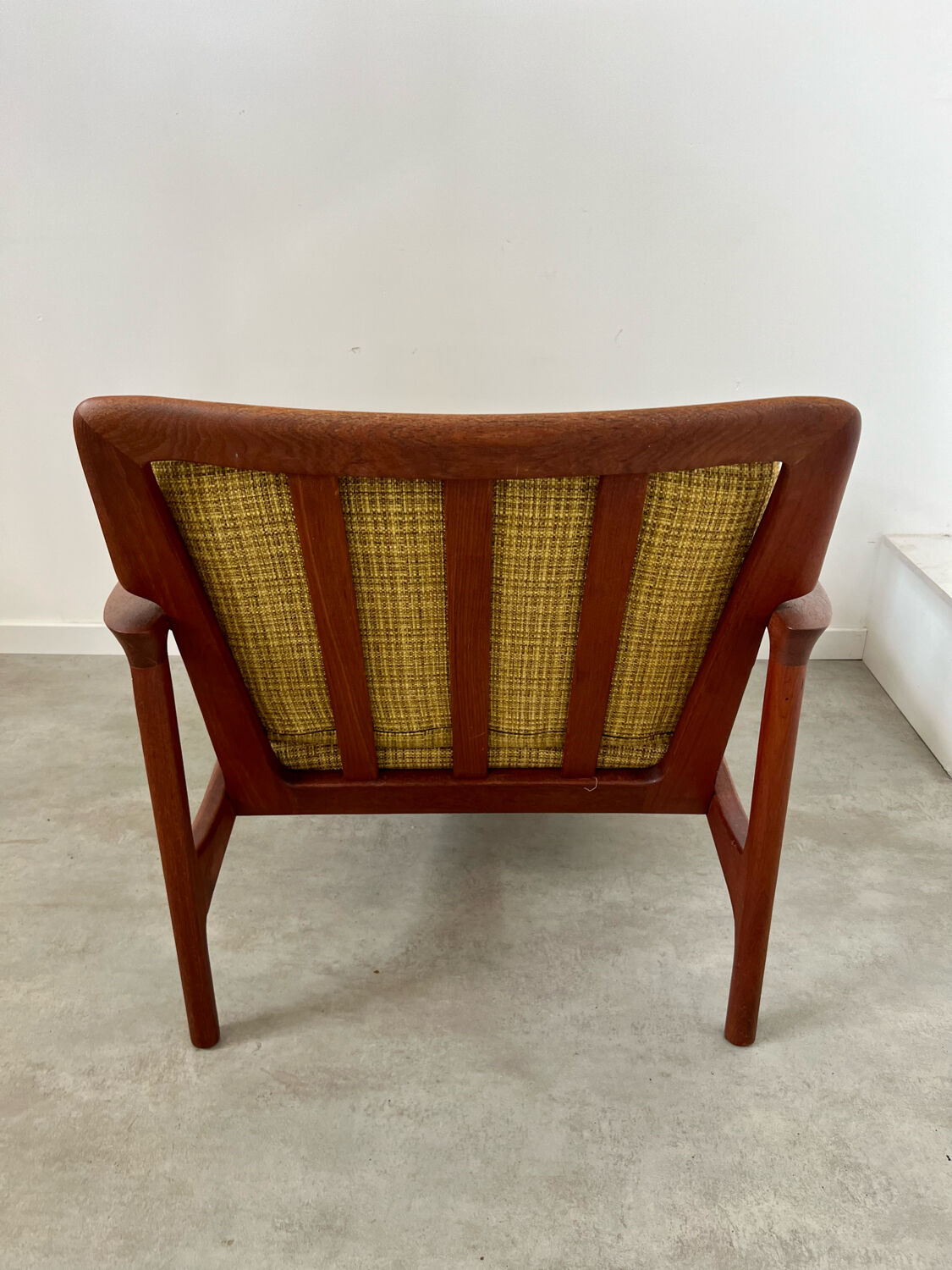 Old Scandinavian design armchair in vintage teak year 60